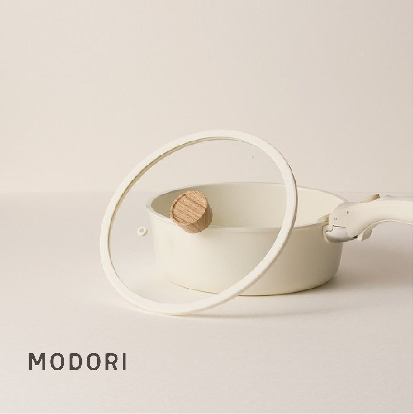 Modori Sodam Cookware Glass Pot Lid 22 cm is specially designed for the Modori sodam cookware set, with the wooden handle and special glass design, it matches perfectly with the 22cm pan in the cookware set. Modori sodam cookware set is a 3-piece stackable cookware set that includes two different-sized cooking pans, a cooking pot and a detachable multi-purpose handle. It has a safe non-stick coating, 100% non-toxic materials for everyday cooking.