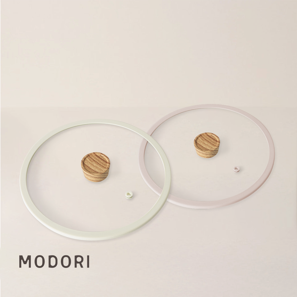Modori Sodam Cookware Glass Pot Lid 22 cm is specially designed for the Modori sodam cookware set, with the wooden handle and special glass design, it matches perfectly with the 22cm pan in the cookware set. Modori sodam cookware set is a 3-piece stackable cookware set that includes two different-sized cooking pans, a cooking pot and a detachable multi-purpose handle. It has a safe non-stick coating, 100% non-toxic materials for everyday cooking.